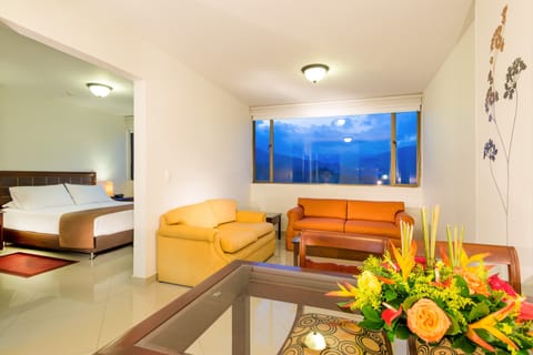 Junior Suite, 1 Queen Bed with Sofa bed | Living room | 26-inch LCD TV with cable channels, TV