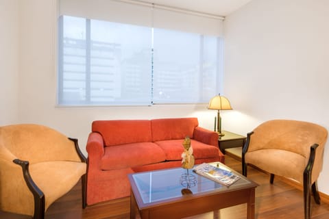 Junior Suite, 1 Queen Bed with Sofa bed | Living room | 26-inch LCD TV with cable channels, TV