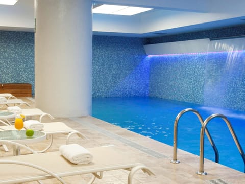 Indoor pool, open 6 AM to 11 PM, sun loungers