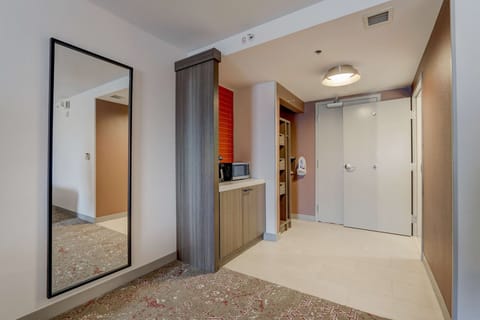 Desk, blackout drapes, iron/ironing board, free cribs/infant beds