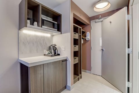 Desk, blackout drapes, iron/ironing board, free cribs/infant beds