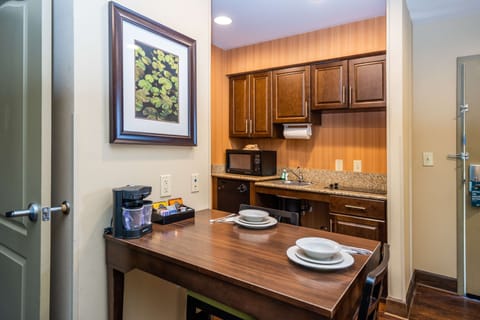 Suite, 1 King Bed, Non Smoking | Private kitchen | Full-size fridge, microwave, stovetop, dishwasher