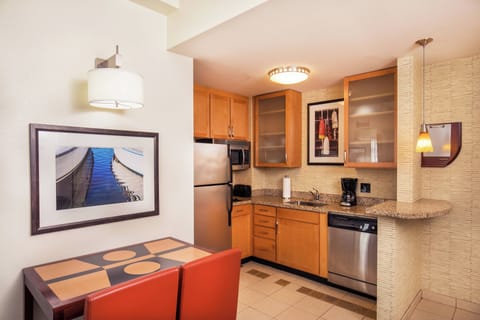 Suite, 1 Bedroom | Private kitchenette | Full-size fridge, microwave, stovetop, dishwasher