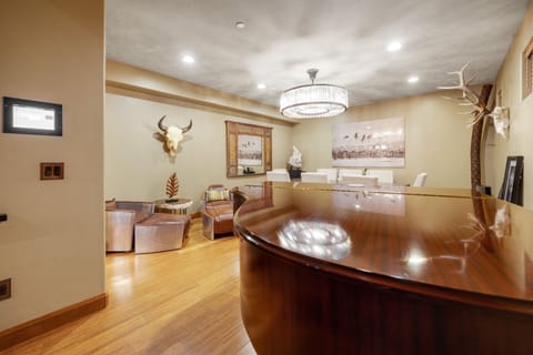 Miller Park Penthouse | Living area | 40-inch flat-screen TV with cable channels, TV, iPod dock