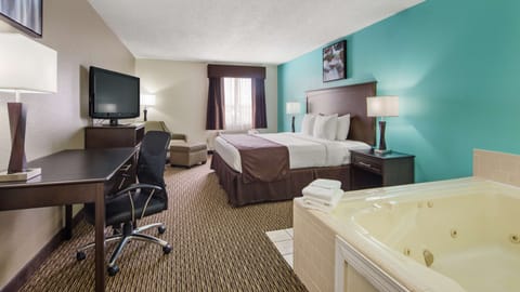 Suite, 1 King Bed, Non Smoking, Jetted Tub | Pillowtop beds, desk, laptop workspace, blackout drapes