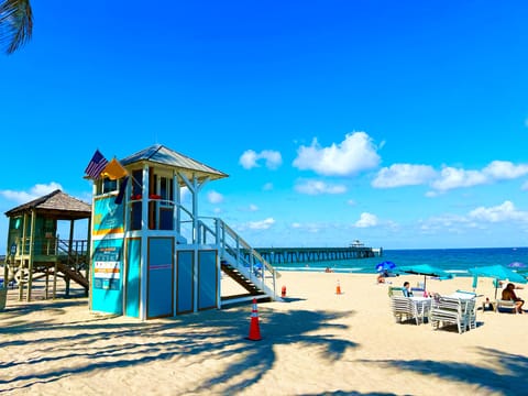 Beach nearby, white sand, sun loungers, beach umbrellas