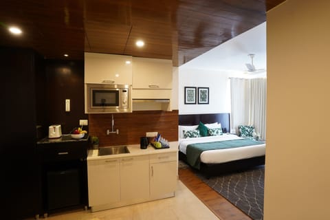 Studio Suite, 1 Bedroom, Accessible, City View | Minibar, in-room safe, individually decorated, individually furnished