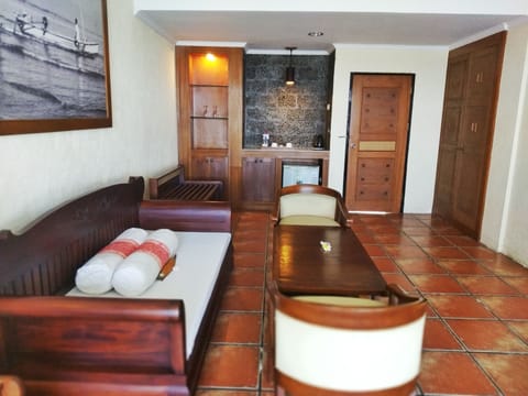 Suite, Sea View (Garden) | Living room | 22-inch LED TV with satellite channels, TV