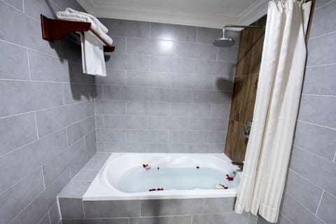 Family Room, 2 Bedrooms, Pool View | Bathroom | Combined shower/tub, deep soaking tub, designer toiletries, hair dryer
