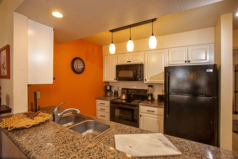 Suite, 1 Bedroom | Private kitchen | Fridge, microwave, oven, stovetop