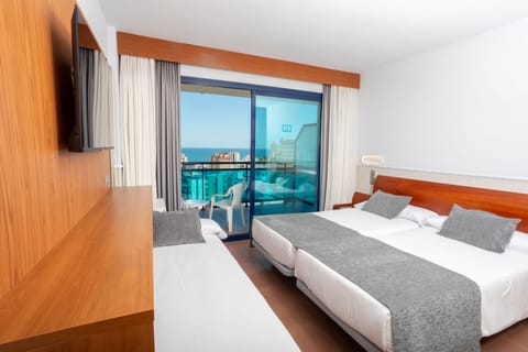 Double Room, Sea View | Minibar, in-room safe, desk, blackout drapes