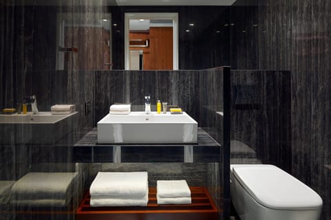 Suite, 1 Bedroom | Bathroom | Combined shower/tub, designer toiletries, hair dryer, slippers