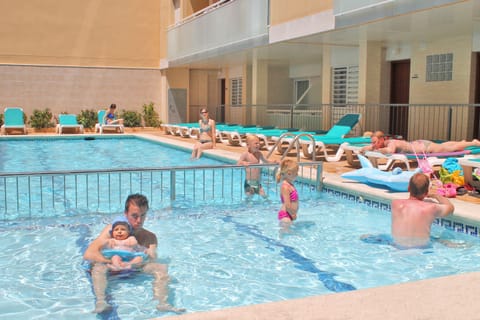 Outdoor pool, open 10:00 AM to 8:00 PM, sun loungers