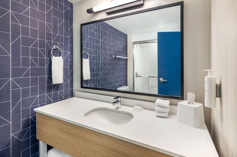 Combined shower/tub, eco-friendly toiletries, hair dryer, towels