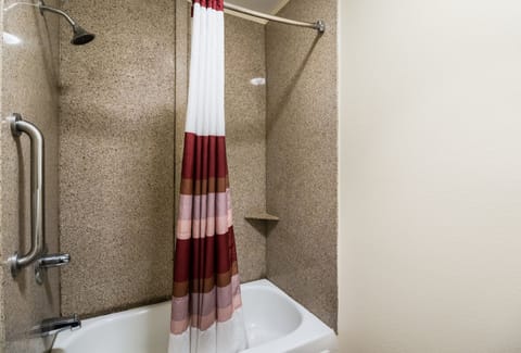 Superior Room, 1 King Bed, Non Smoking | Bathroom | Combined shower/tub, free toiletries, hair dryer, towels