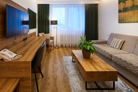 Family Suite | Living area | Flat-screen TV