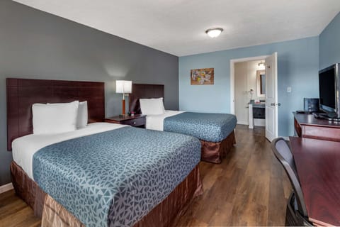 Efficiency, Deluxe Room, 2 Double Beds, Non Smoking | Soundproofing, iron/ironing board, cribs/infant beds, rollaway beds