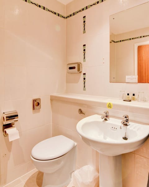 Combined shower/tub, hair dryer, towels, soap