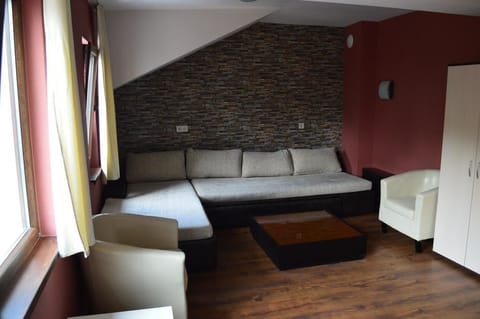 Duplex Suite | Living area | Flat-screen TV