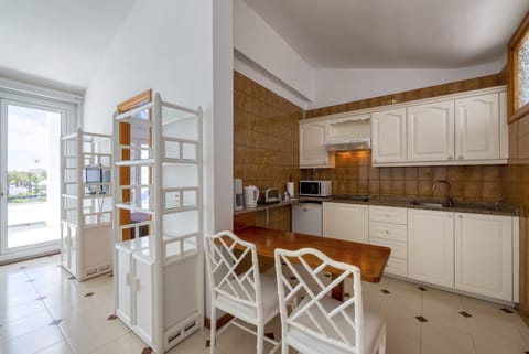 Standard Apartment, 2 Bedrooms | Private kitchen | Full-size fridge, microwave, stovetop, coffee/tea maker