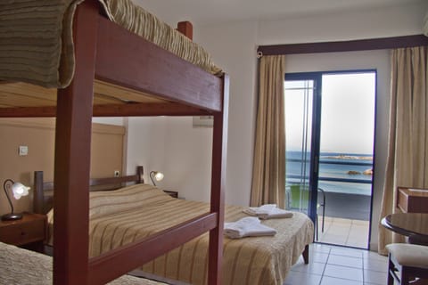 Triple Room, Sea View | In-room safe, blackout drapes, free WiFi, bed sheets