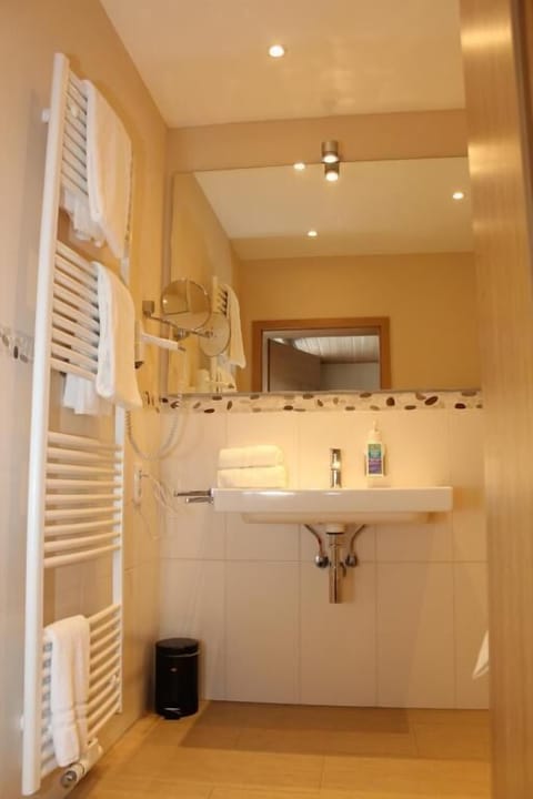 Deep soaking tub, eco-friendly toiletries, hair dryer, slippers