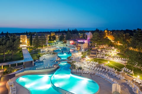 Indoor pool, outdoor pool, pool umbrellas