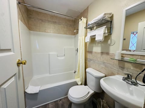 Standard Room, 2 Queen Beds, Non Smoking, Refrigerator & Microwave | Bathroom | Combined shower/tub, free toiletries, hair dryer, towels