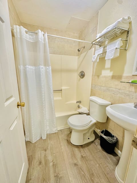 Standard Room, 2 Queen Beds, Non Smoking, Refrigerator & Microwave | Bathroom | Combined shower/tub, free toiletries, hair dryer, towels