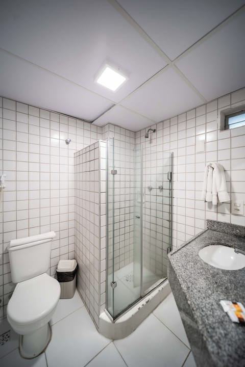 Standard Triple Room, Sea View | Bathroom | Shower, hair dryer, towels