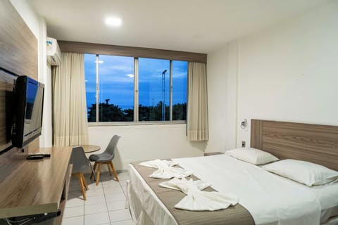 Double or Twin Room, Sea View | Minibar, in-room safe, free WiFi, bed sheets