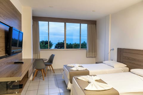 Double or Twin Room, Sea View | Minibar, in-room safe, free WiFi, bed sheets