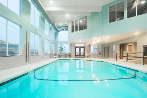 Indoor pool, open 6 AM to midnight, sun loungers