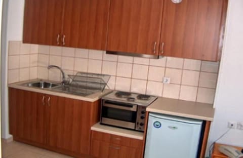 Fridge, microwave, cookware/dishes/utensils