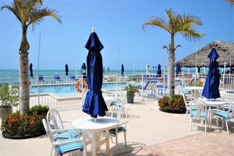 2 outdoor pools, open 8 AM to 9 PM, pool umbrellas, sun loungers