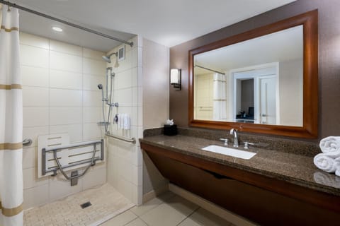 Combined shower/tub, designer toiletries, hair dryer, bathrobes