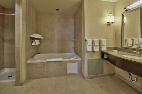 Suite, 1 King Bed, Accessible | Bathroom | Designer toiletries, hair dryer, towels