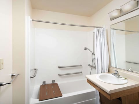 Combined shower/tub, hair dryer, towels, soap