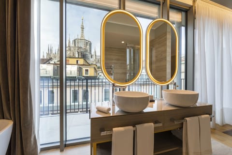 Duomo Panoramic Penthouse One Bedroom | Bathroom | Eco-friendly toiletries, hair dryer, bathrobes, bidet