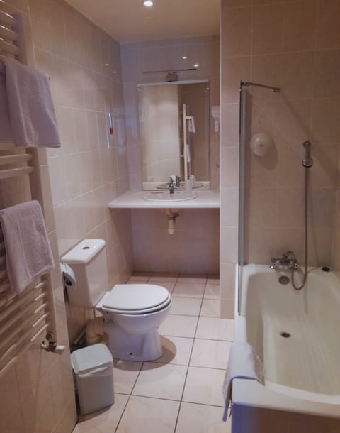 Quadruple Room | Bathroom | Deep soaking tub, free toiletries, hair dryer, towels