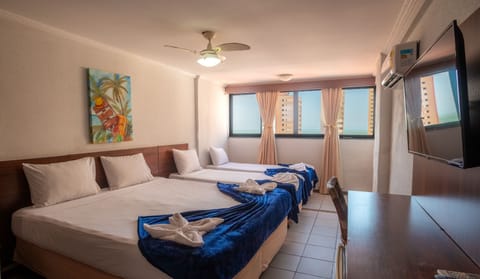 Apartamento Standard Casal + 2 | Minibar, blackout drapes, free WiFi, bed sheets