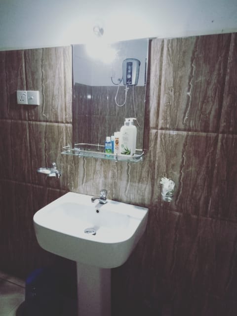 Bathroom | Shower, free toiletries, hair dryer, bathrobes