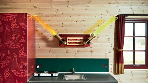 Fridge, stovetop, electric kettle, cookware/dishes/utensils