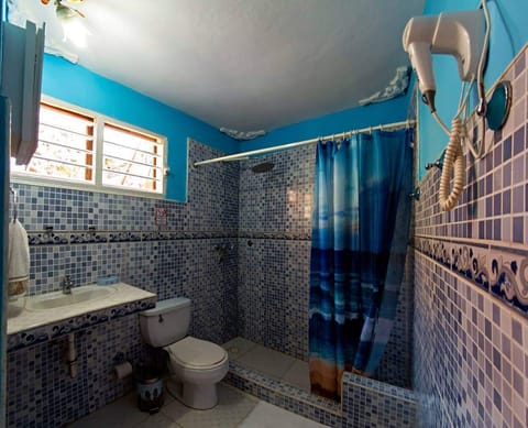 Shower, rainfall showerhead, hair dryer, towels