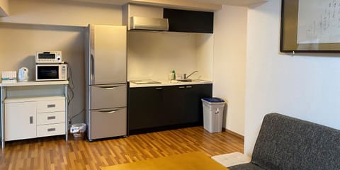 Deluxe Apartment, Multiple Beds, Non Smoking | Private kitchen | Fridge, microwave, stovetop, toaster