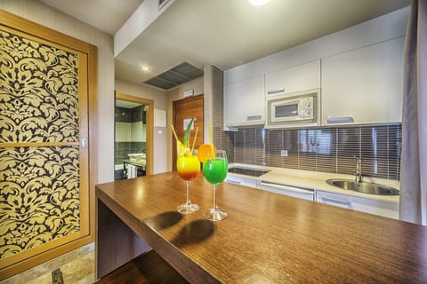 Fridge, microwave, stovetop, cookware/dishes/utensils