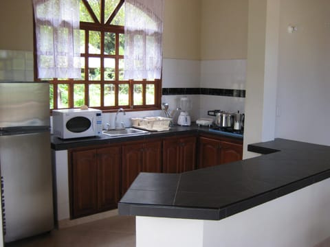 House, 2 Bedrooms (10 people) | Private kitchen | Full-size fridge, microwave, stovetop, coffee/tea maker