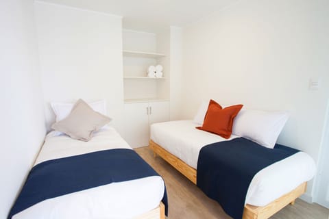 2 bedrooms, premium bedding, down comforters, in-room safe