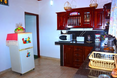 3-Bedroom Villa | Private kitchen | Full-size fridge, microwave, rice cooker, cookware/dishes/utensils