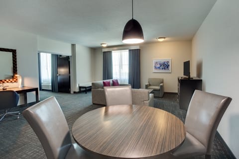 Suite, 1 Bedroom | Desk, blackout drapes, iron/ironing board, cribs/infant beds